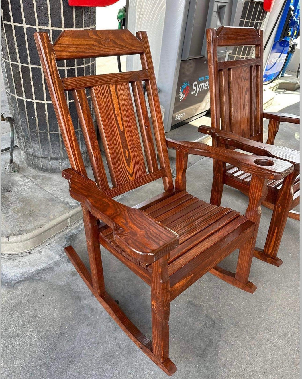 2 red mahogany rocking chairs