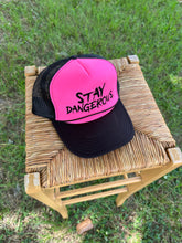 Stay Dangerous pink trucker