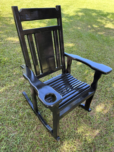 2 black chairs engraved name “Shaw”