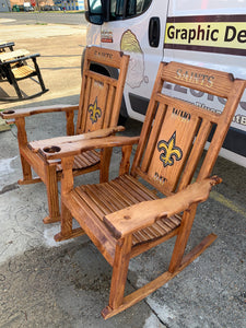 2  stained rocking chairs and coffee table